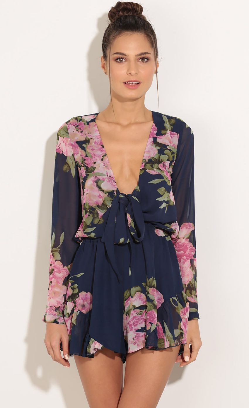 Picture Floral Wrap Romper In Navy Blue. Source: https://media-img.lucyinthesky.com/data/Feb16_1/850xAUTO/0Y5A3066.JPG