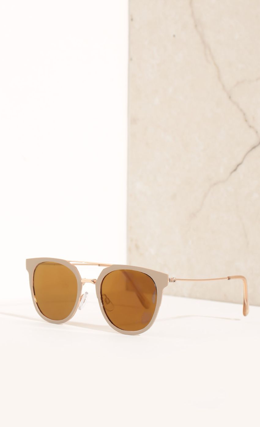 Picture Aviator Sunglasses In Sand. Source: https://media-img.lucyinthesky.com/data/Feb16_1/850xAUTO/0Y5A3675.JPG