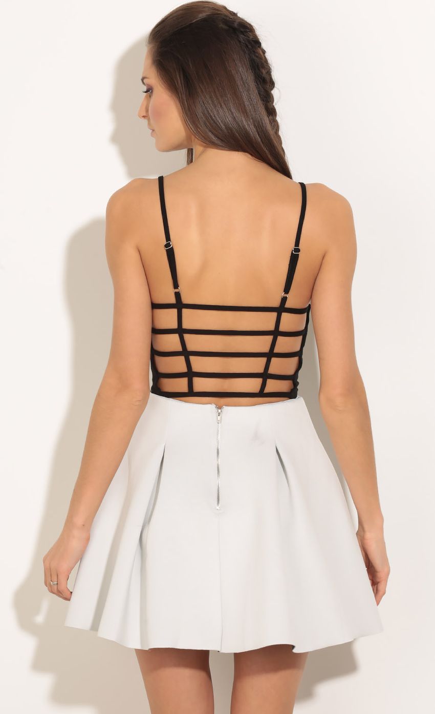 Picture Open-Back Knit Bodysuit In Black. Source: https://media-img.lucyinthesky.com/data/Feb16_1/850xAUTO/0Y5A6033.JPG