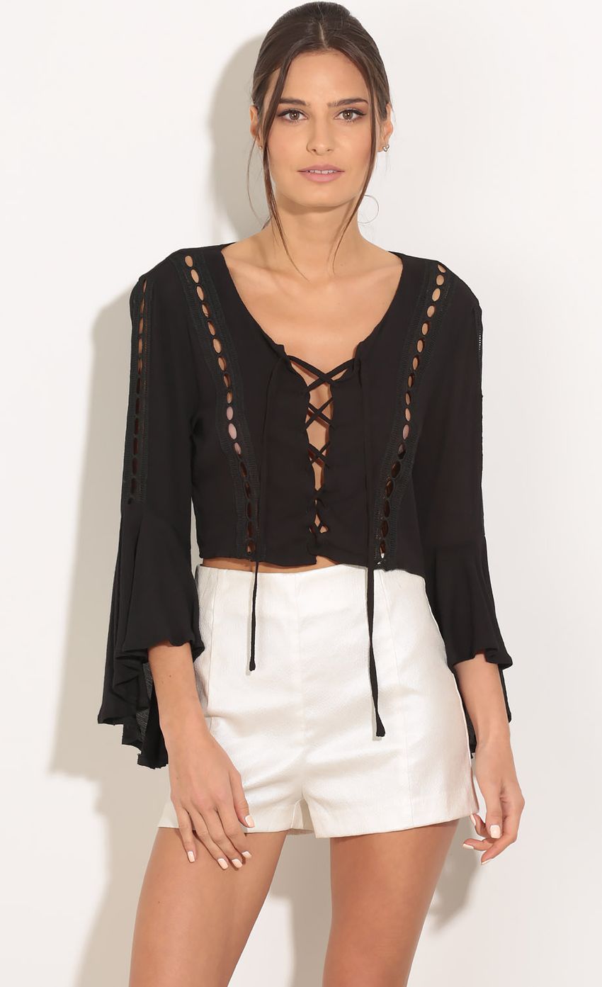 Picture Bell Sleeve Lace-Up Crop Top In Black. Source: https://media-img.lucyinthesky.com/data/Feb16_1/850xAUTO/0Y5A7672.JPG
