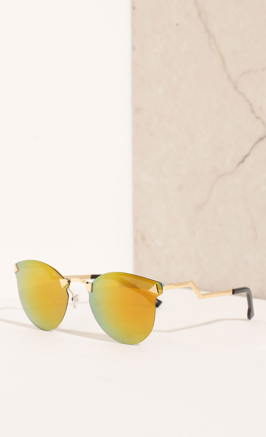 Picture Edgy Angle Sunglasses In Sunrise. Source: https://media-img.lucyinthesky.com/data/Feb16_1/850xAUTO/0Y5A9908.JPG