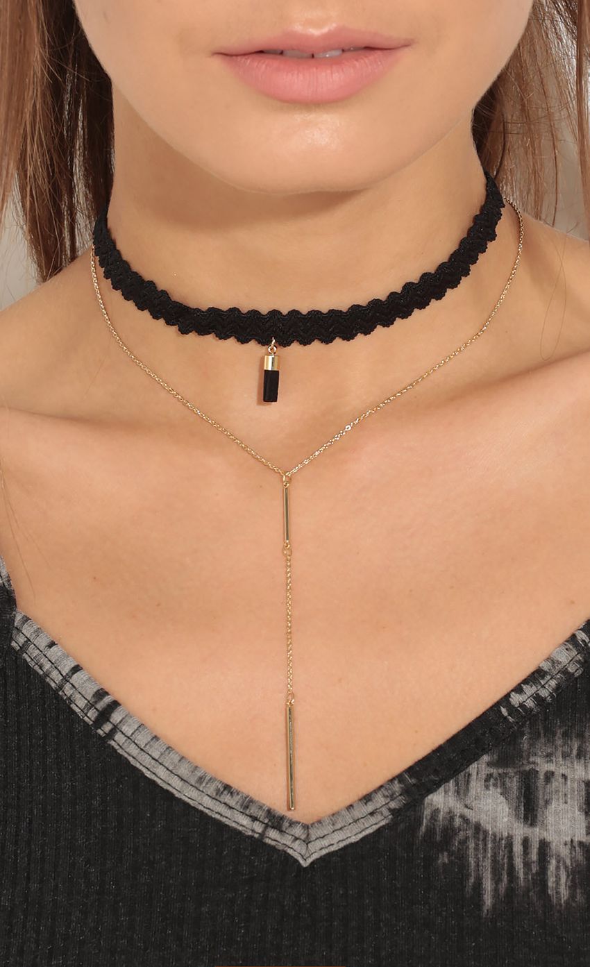 Picture Choker And Chain Necklace In Black and Gold. Source: https://media-img.lucyinthesky.com/data/Feb16_2/850xAUTO/0Y5A1027_COPY.JPG