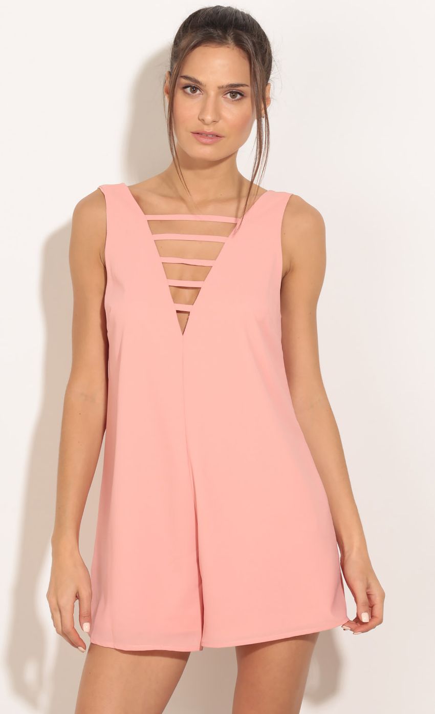 Picture Strappy Oversized Romper In Pink. Source: https://media-img.lucyinthesky.com/data/Feb16_2/850xAUTO/0Y5A8288.JPG