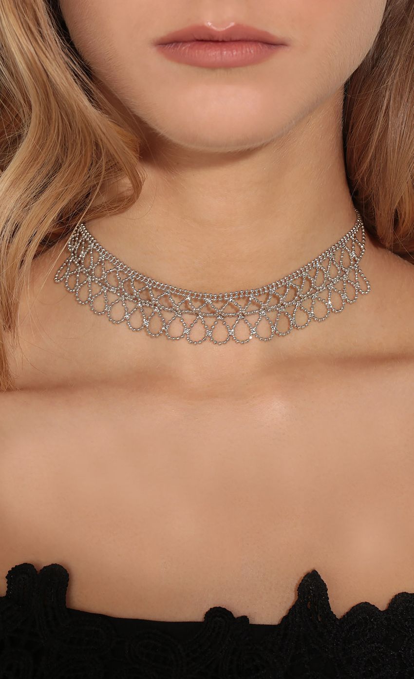 Picture Braided Chain Cut-Out Choker In Silver. Source: https://media-img.lucyinthesky.com/data/Feb17_1/850xAUTO/0Y5A4461.JPG