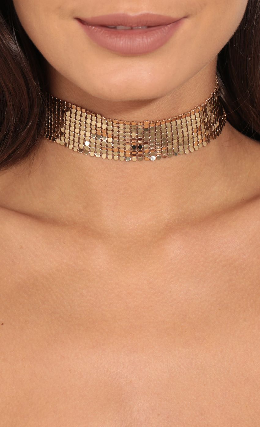 Picture Metallic Choker Necklace In Gold. Source: https://media-img.lucyinthesky.com/data/Feb17_2/850xAUTO/0Y5A9712.JPG