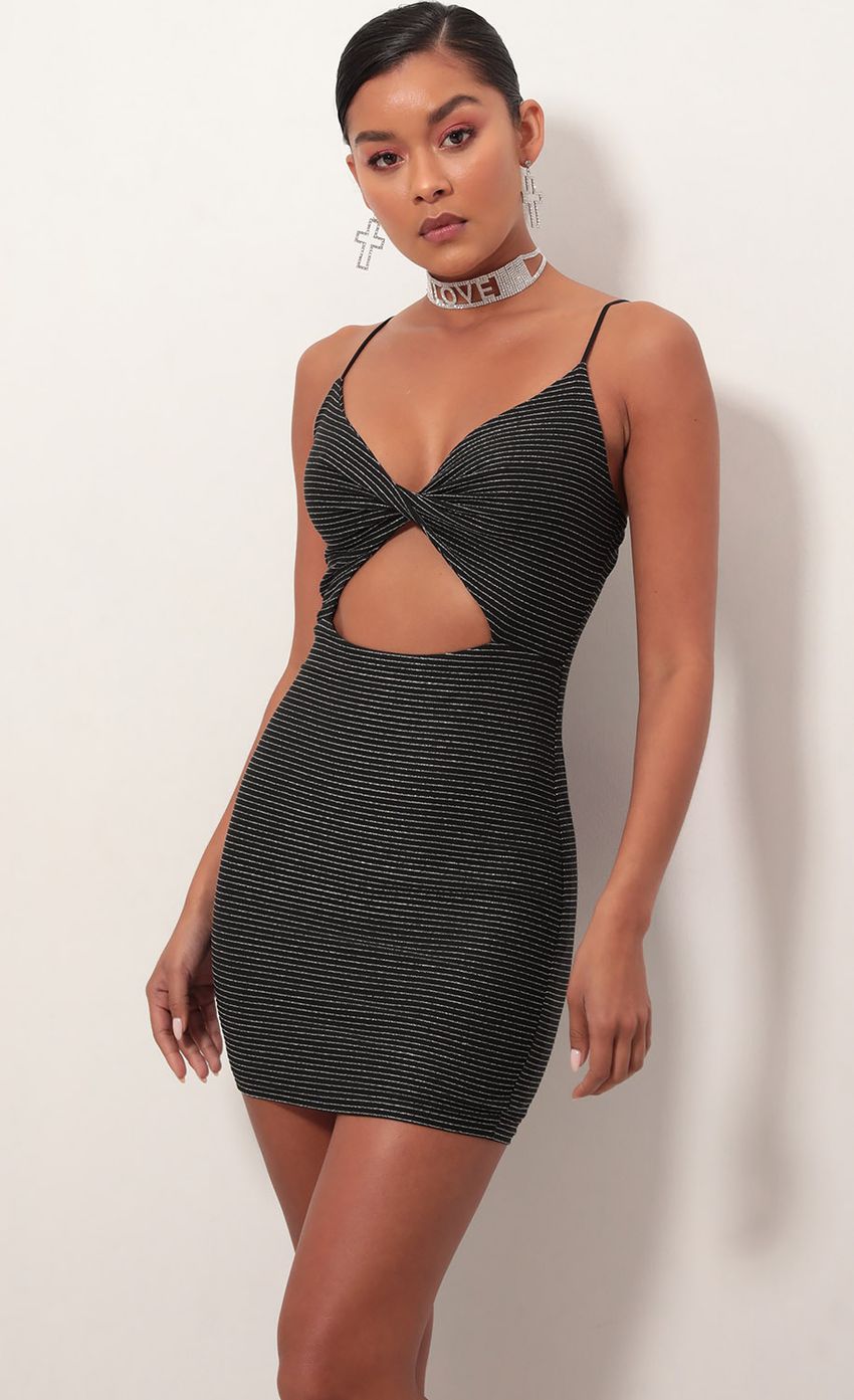 Picture Scarlett Front Twist Shimmer Dress in Black Stripes. Source: https://media-img.lucyinthesky.com/data/Feb19_1/850xAUTO/781A5406S.JPG