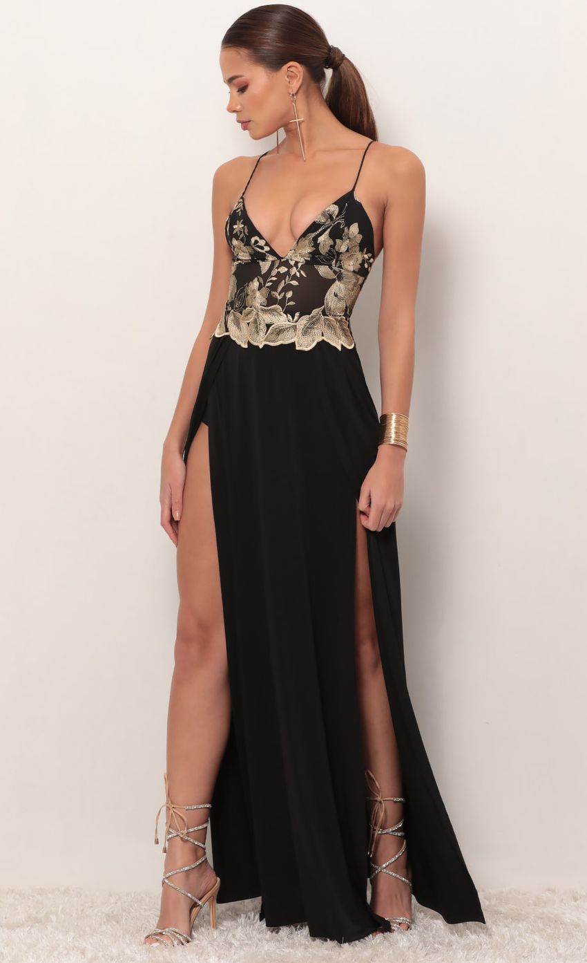 Picture Tulum Gold Embroidered Maxi Dress in Black. Source: https://media-img.lucyinthesky.com/data/Feb19_2/850xAUTO/781A0748.JPG