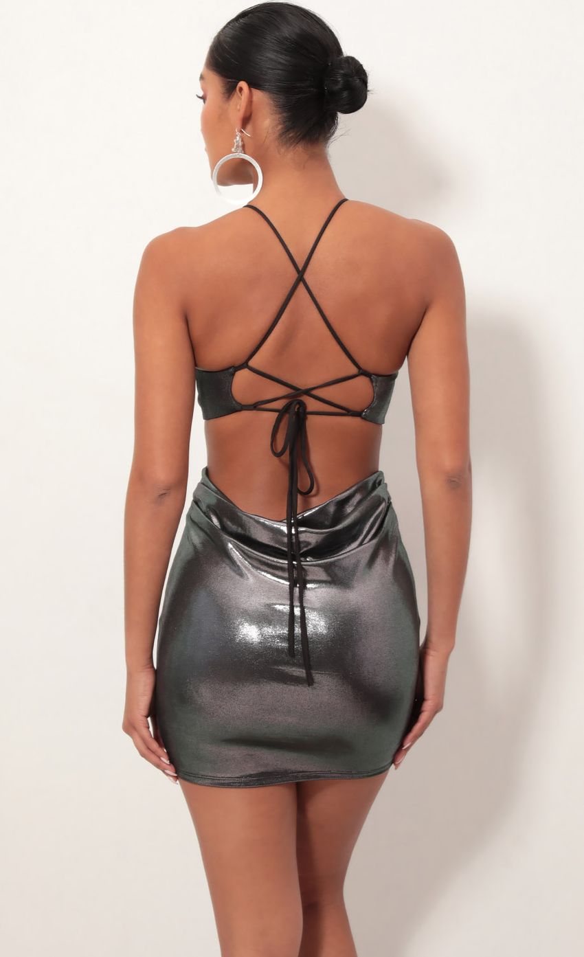 Picture Metallic Cowl Back Dress in Iridescent Silver. Source: https://media-img.lucyinthesky.com/data/Feb19_2/850xAUTO/781A8216S.JPG
