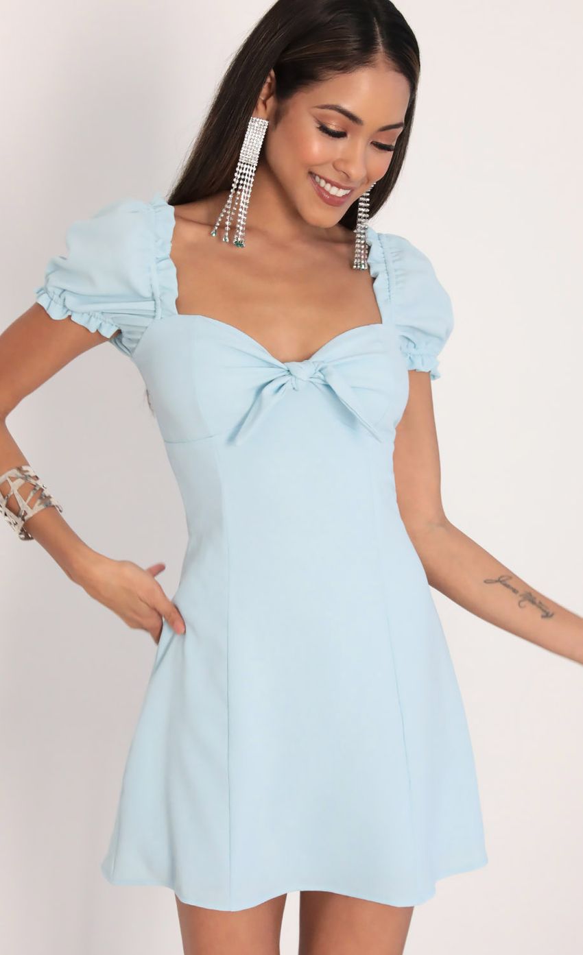 Picture Justina Puff Sleeve Dress in Blue. Source: https://media-img.lucyinthesky.com/data/Feb20_1/850xAUTO/781A1818.JPG