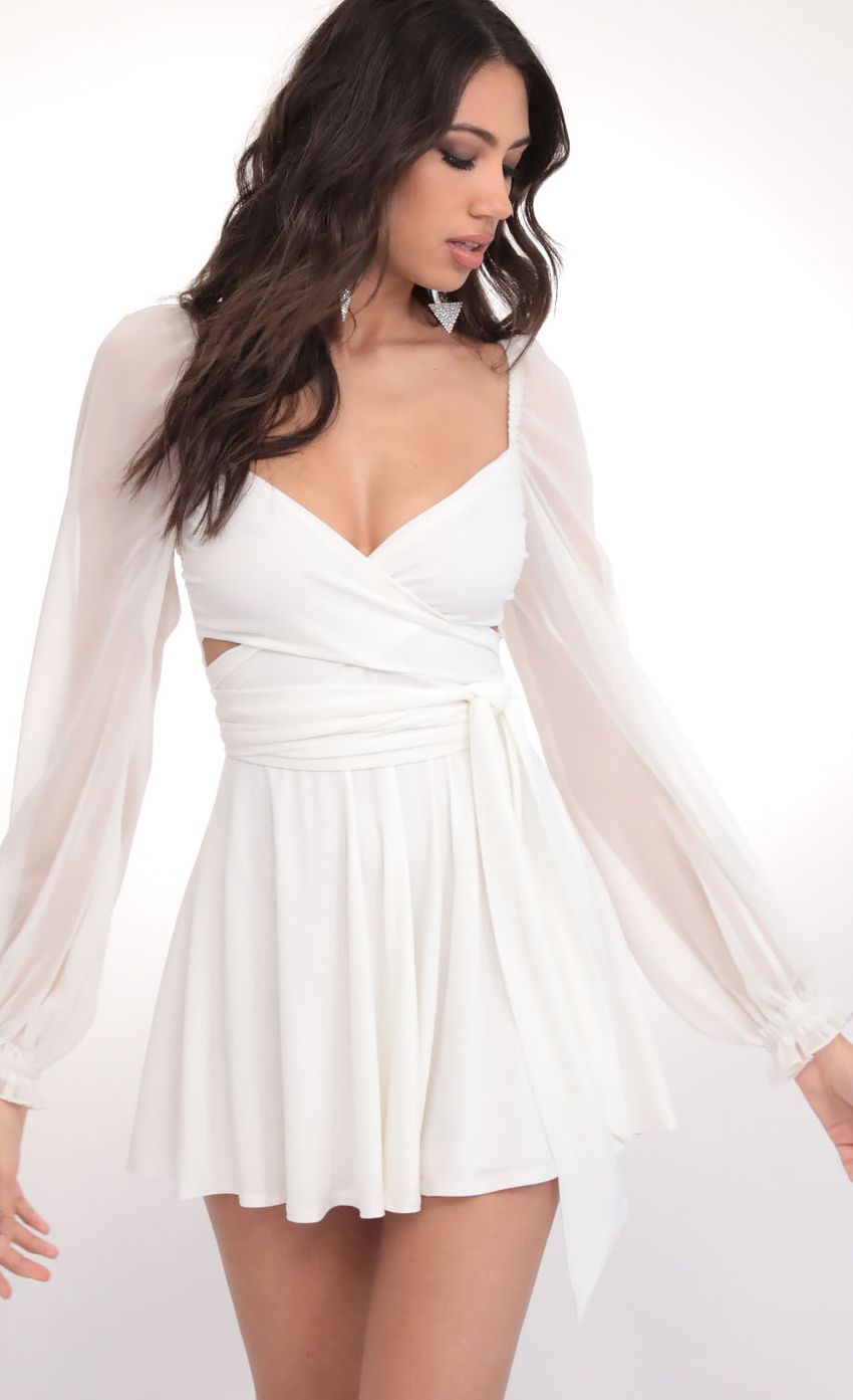 Picture Puff Chiffon Wrap Dress in Ivory. Source: https://media-img.lucyinthesky.com/data/Feb20_1/850xAUTO/781A7720.JPG