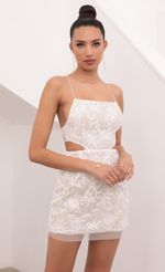 Picture Lace Cutout Dress in White Sequined Lace. Source: https://media-img.lucyinthesky.com/data/Feb21_1/150xAUTO/1V9A7739.JPG