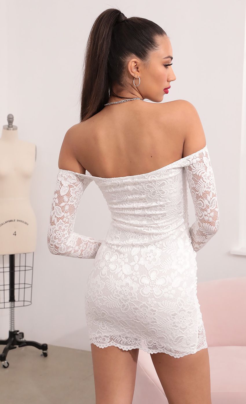 Picture Scalloped Lace Dress in White. Source: https://media-img.lucyinthesky.com/data/Feb21_1/850xAUTO/1V9A1876.JPG