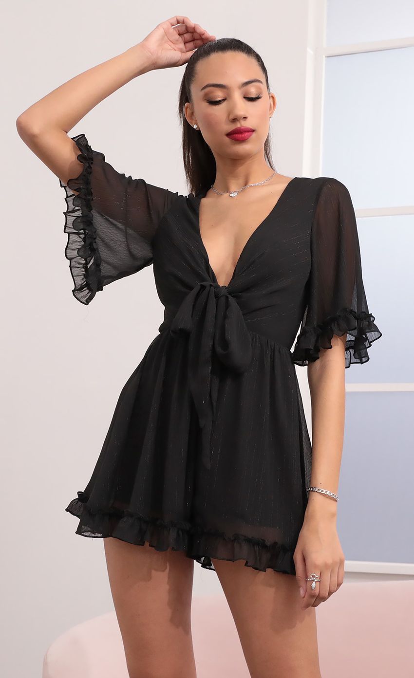 Picture Ruffle Romper in Black. Source: https://media-img.lucyinthesky.com/data/Feb21_1/850xAUTO/1V9A2500.JPG