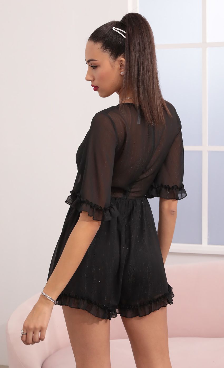 Picture Ruffle Romper in Black. Source: https://media-img.lucyinthesky.com/data/Feb21_1/850xAUTO/1V9A2572.JPG