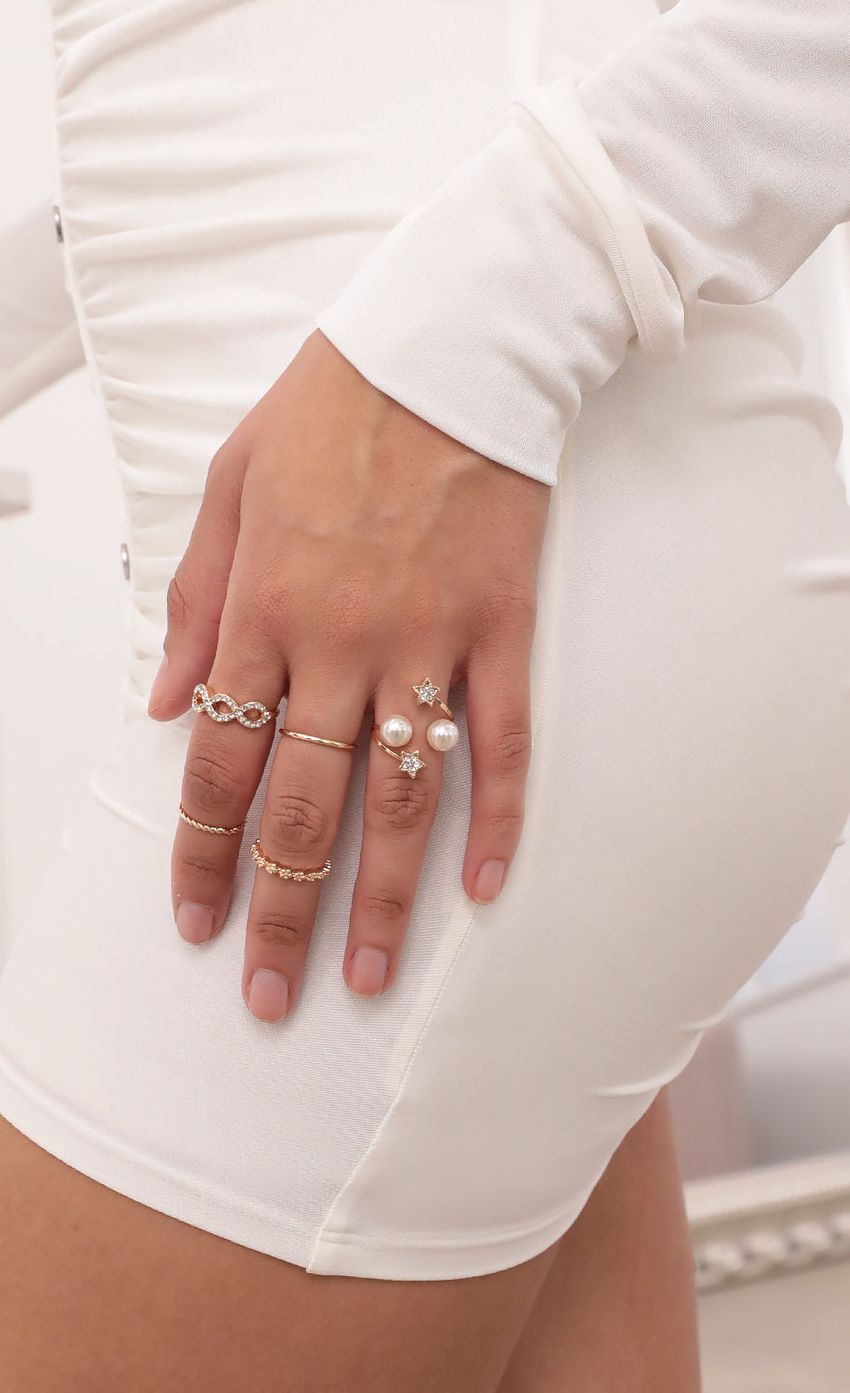Picture Daydreamer Ring Set in Gold. Source: https://media-img.lucyinthesky.com/data/Feb21_1/850xAUTO/1V9A4335.JPG