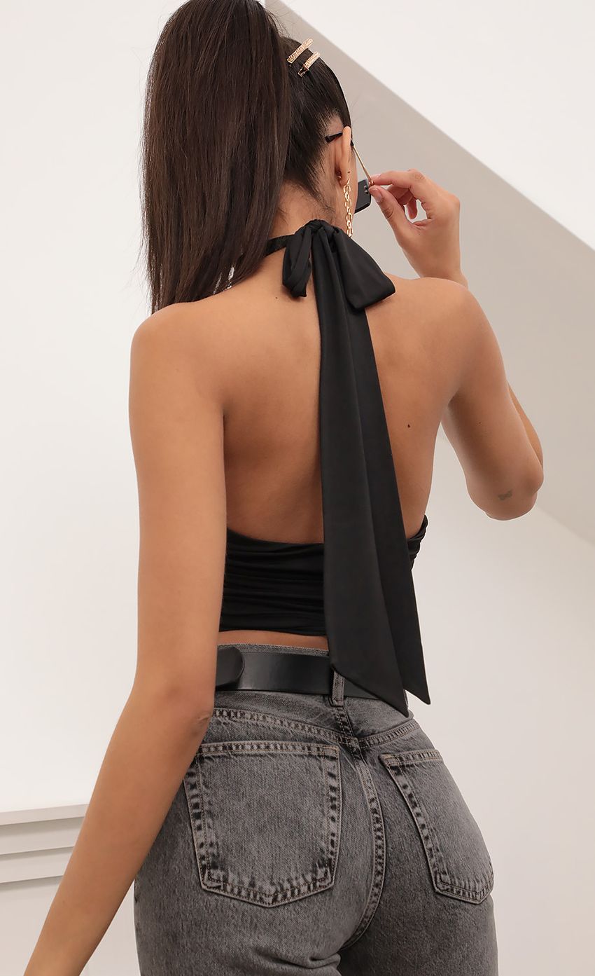 Picture Wrap Top in Black. Source: https://media-img.lucyinthesky.com/data/Feb21_1/850xAUTO/AT2A2506.JPG