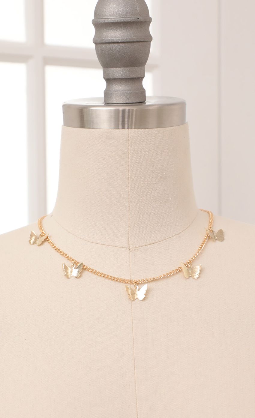 Picture Dainty Butterfly Charm Choker in Gold. Source: https://media-img.lucyinthesky.com/data/Feb21_1/850xAUTO/AT2A9256.JPG