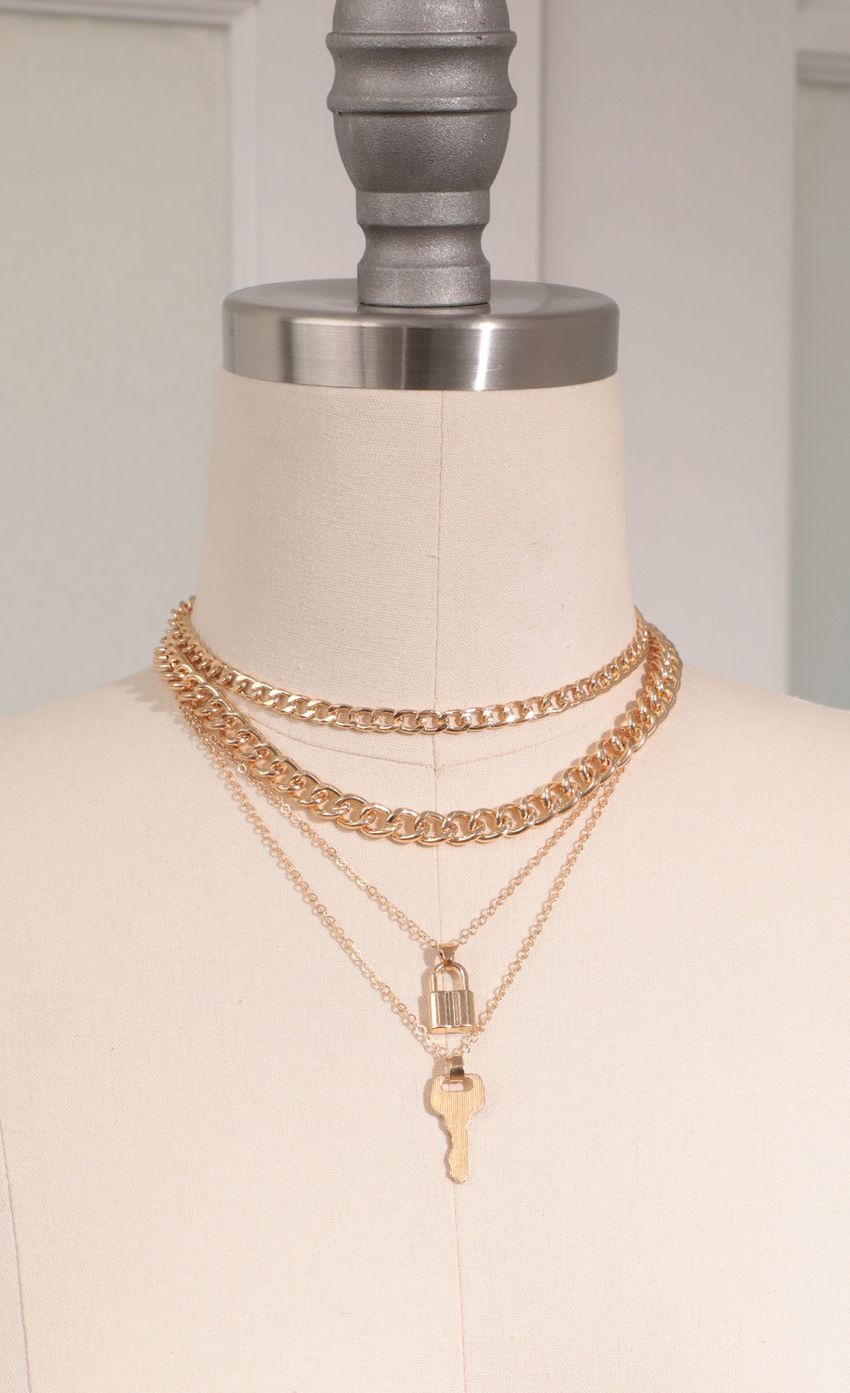 Picture Lock Me Up Necklace in Gold. Source: https://media-img.lucyinthesky.com/data/Feb21_1/850xAUTO/AT2A9410.JPG