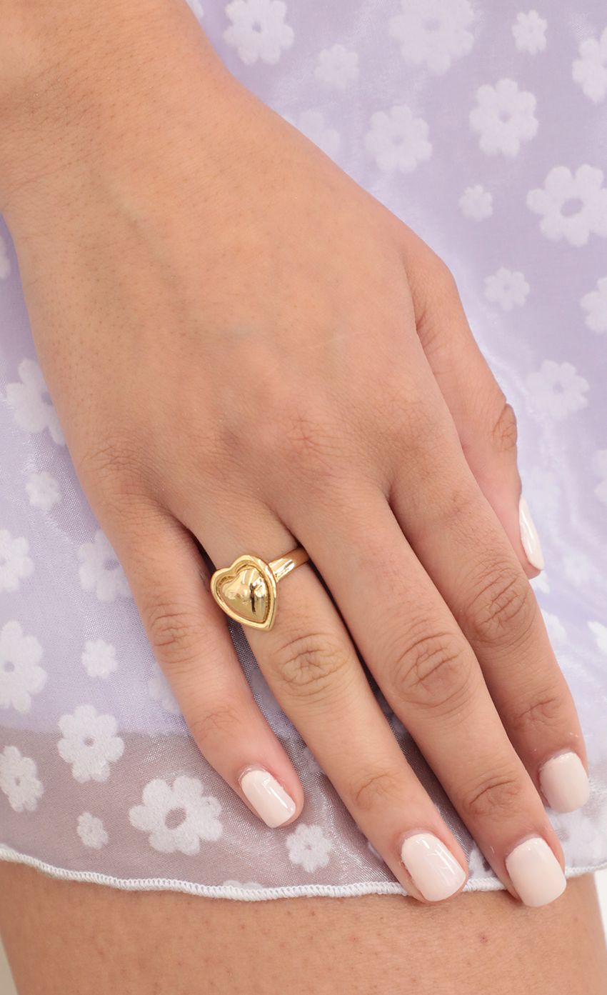 Picture Heart Shaped Gold Ring. Source: https://media-img.lucyinthesky.com/data/Feb21_2/850xAUTO/AT2A1289_COPY.JPG