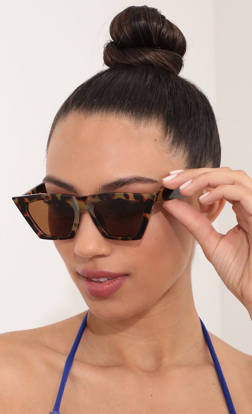 Picture Phoebe Square Cat-Eye Sunglasses in Havana Brown. Source: https://media-img.lucyinthesky.com/data/Feb21_2/850xAUTO/AT2A1814_COPY.JPG