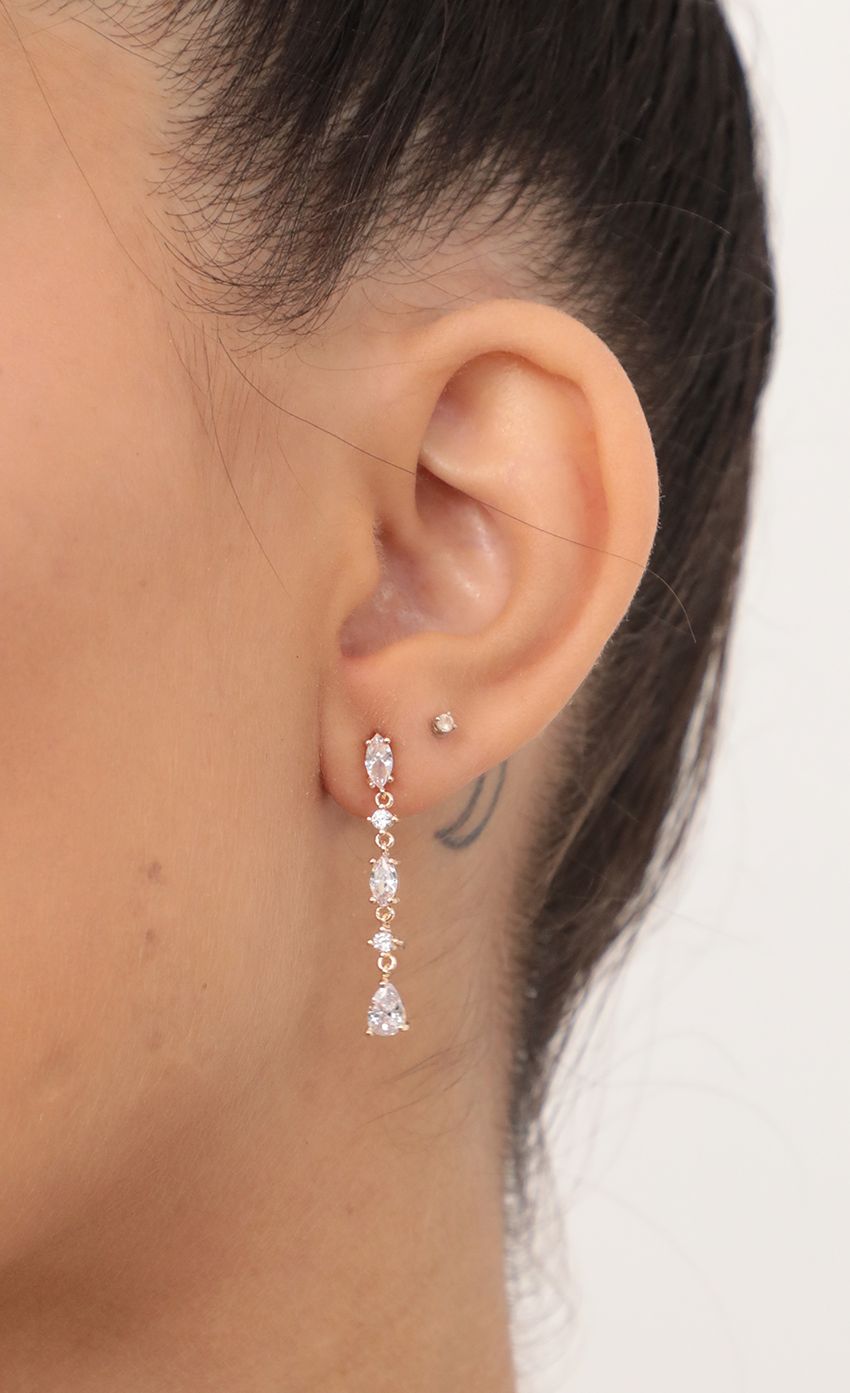 Picture Marquise Dainty Drop Earrings in Gold. Source: https://media-img.lucyinthesky.com/data/Feb21_2/850xAUTO/AT2A2425_COPY.JPG