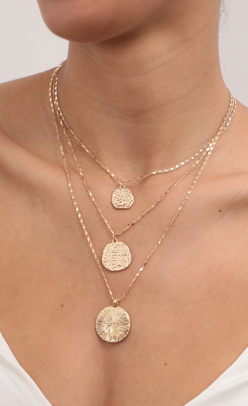 Picture Multi Layered Chain Necklace With Coin Pendant. Source: https://media-img.lucyinthesky.com/data/Feb21_2/850xAUTO/AT2A3666.JPG