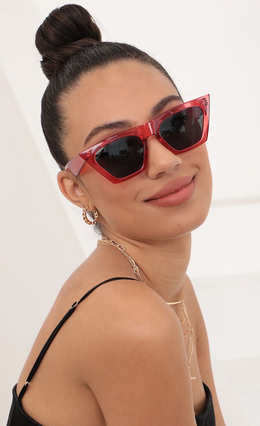 Picture Phoebe Square Cat-Eye Sunglasses in Red. Source: https://media-img.lucyinthesky.com/data/Feb21_2/850xAUTO/AT2A4092_COPY.JPG