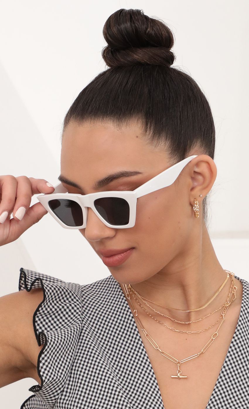 Picture Phoebe Square Cat-Eye Sunglasses in White. Source: https://media-img.lucyinthesky.com/data/Feb21_2/850xAUTO/AT2A4355_COPY.JPG