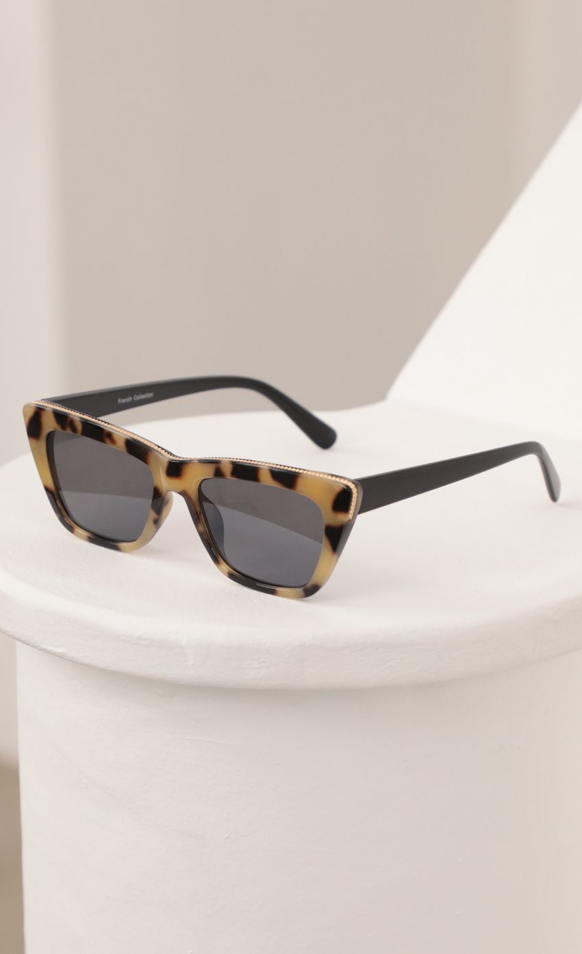 Picture Edge Sunglasses in Tortoise. Source: https://media-img.lucyinthesky.com/data/Feb21_2/850xAUTO/AT2A6013.JPG