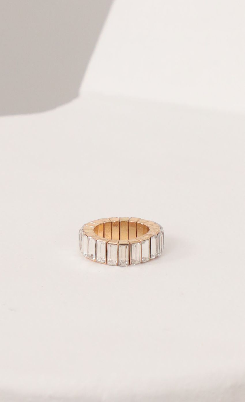 Picture Baguette ring in Gold. Source: https://media-img.lucyinthesky.com/data/Feb21_2/850xAUTO/AT2A6058_COPY.JPG