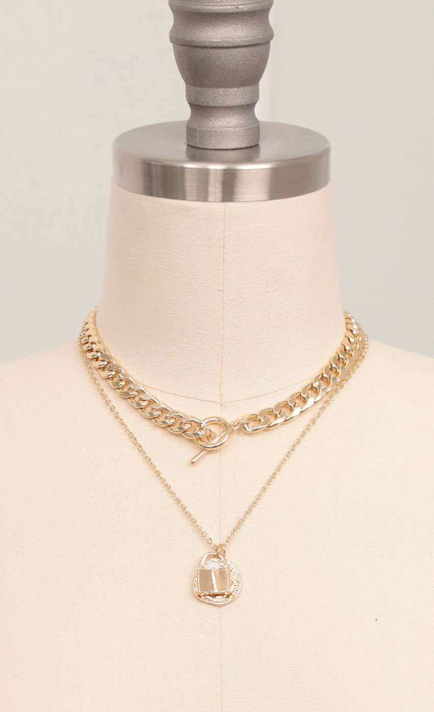 Picture Two-Layer Necklace Set in Gold. Source: https://media-img.lucyinthesky.com/data/Feb21_2/850xAUTO/AT2A6135_COPY.JPG