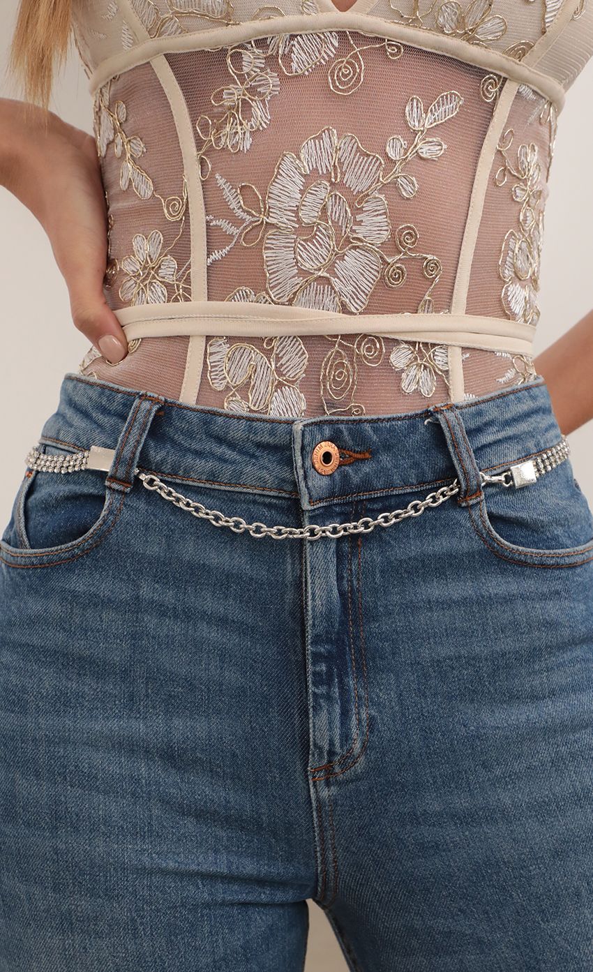 Picture Crystal Embellished Chain Belt in Silver. Source: https://media-img.lucyinthesky.com/data/Feb21_2/850xAUTO/AT2A6156_COPY.JPG