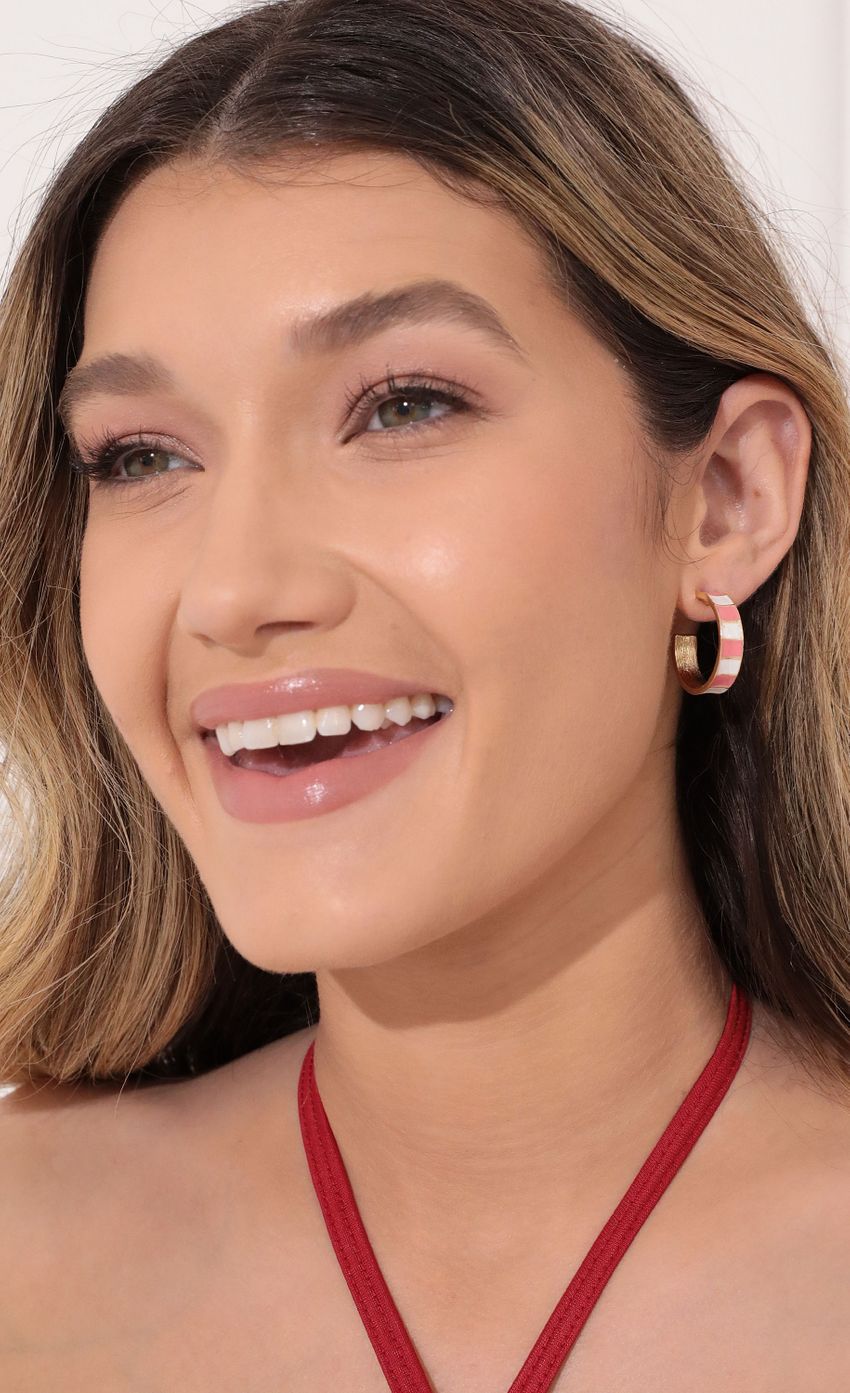 Picture Disco Dreams Earring in Pink. Source: https://media-img.lucyinthesky.com/data/Feb22_1/850xAUTO/1V9A1746.JPG