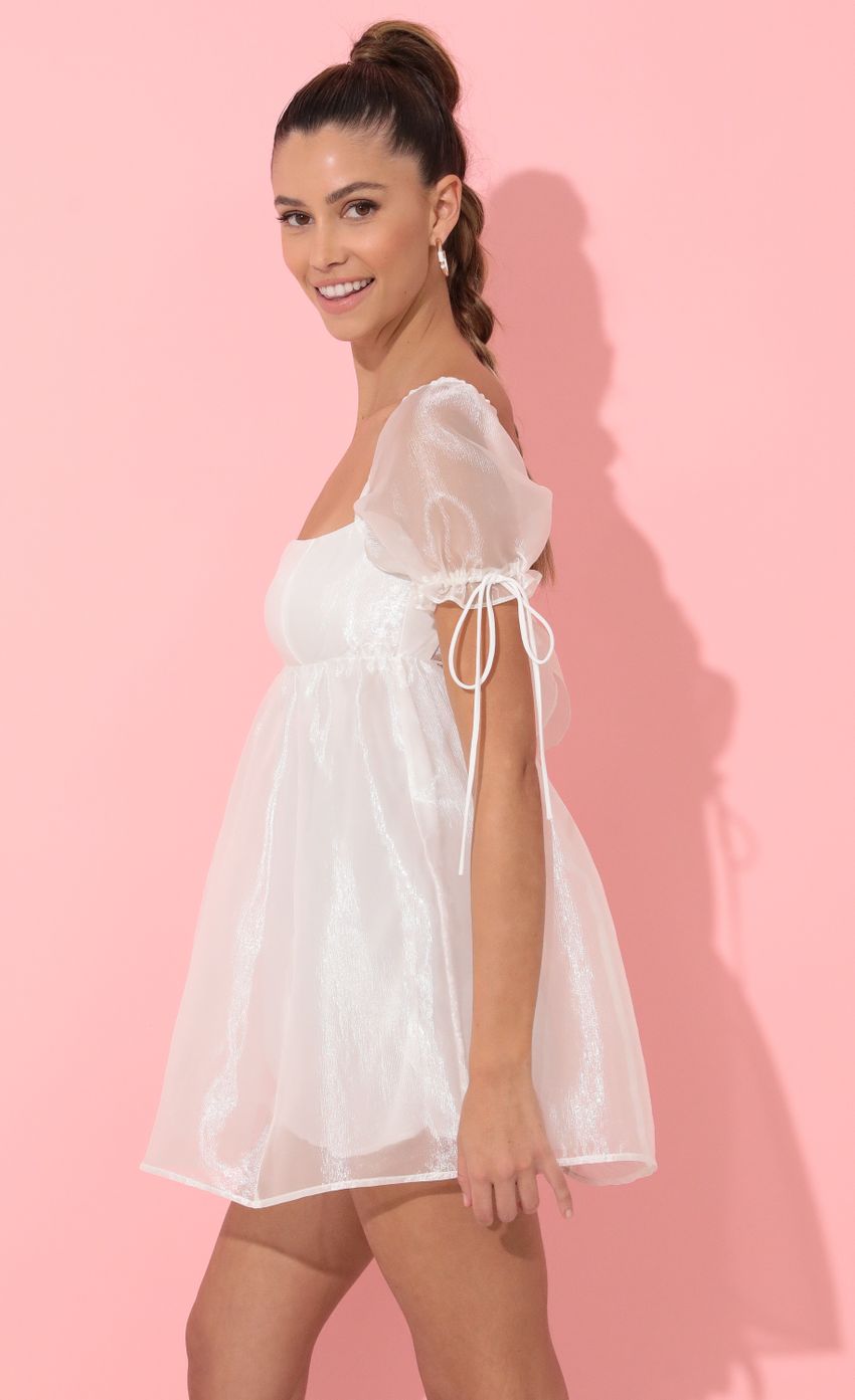 Picture Baby Doll Dress in White. Source: https://media-img.lucyinthesky.com/data/Feb22_2/850xAUTO/1V9A6028.JPG