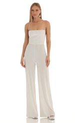 Picture Harlin Striped Velvet Jumpsuit in White. Source: https://media-img.lucyinthesky.com/data/Feb23/150xAUTO/226cc3fe-2987-4d5c-9f2e-e7d69b6d9e84.jpg
