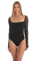 Picture Mesh Long Sleeve Bodysuit in Black. Source: https://media-img.lucyinthesky.com/data/Feb23/150xAUTO/51174749-414b-4a7c-9a6c-7daa7570661e.jpg