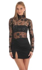 Picture Tulle Glitter Sheer Mock Neck Dress in Black. Source: https://media-img.lucyinthesky.com/data/Feb23/150xAUTO/79e00fe7-0db9-44e0-a7f6-6ebb22266fb5.jpg