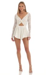 Picture Sequin Lace Romper in White. Source: https://media-img.lucyinthesky.com/data/Feb23/150xAUTO/7a525cc2-940f-4513-a50e-abadb29e383f.jpg