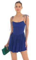 Picture Draped Corset Ruffled Dress in Royal Blue. Source: https://media-img.lucyinthesky.com/data/Feb23/150xAUTO/d057d835-90d6-4c42-959e-0e03ddd6eed9.jpg