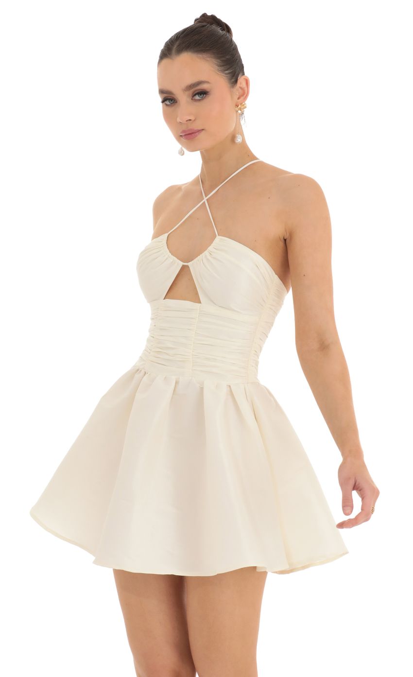 Picture Ruched Front Cross Dress in Cream. Source: https://media-img.lucyinthesky.com/data/Feb23/850xAUTO/08bffa4e-abc6-4014-8dca-2e792fb6ea49.jpg