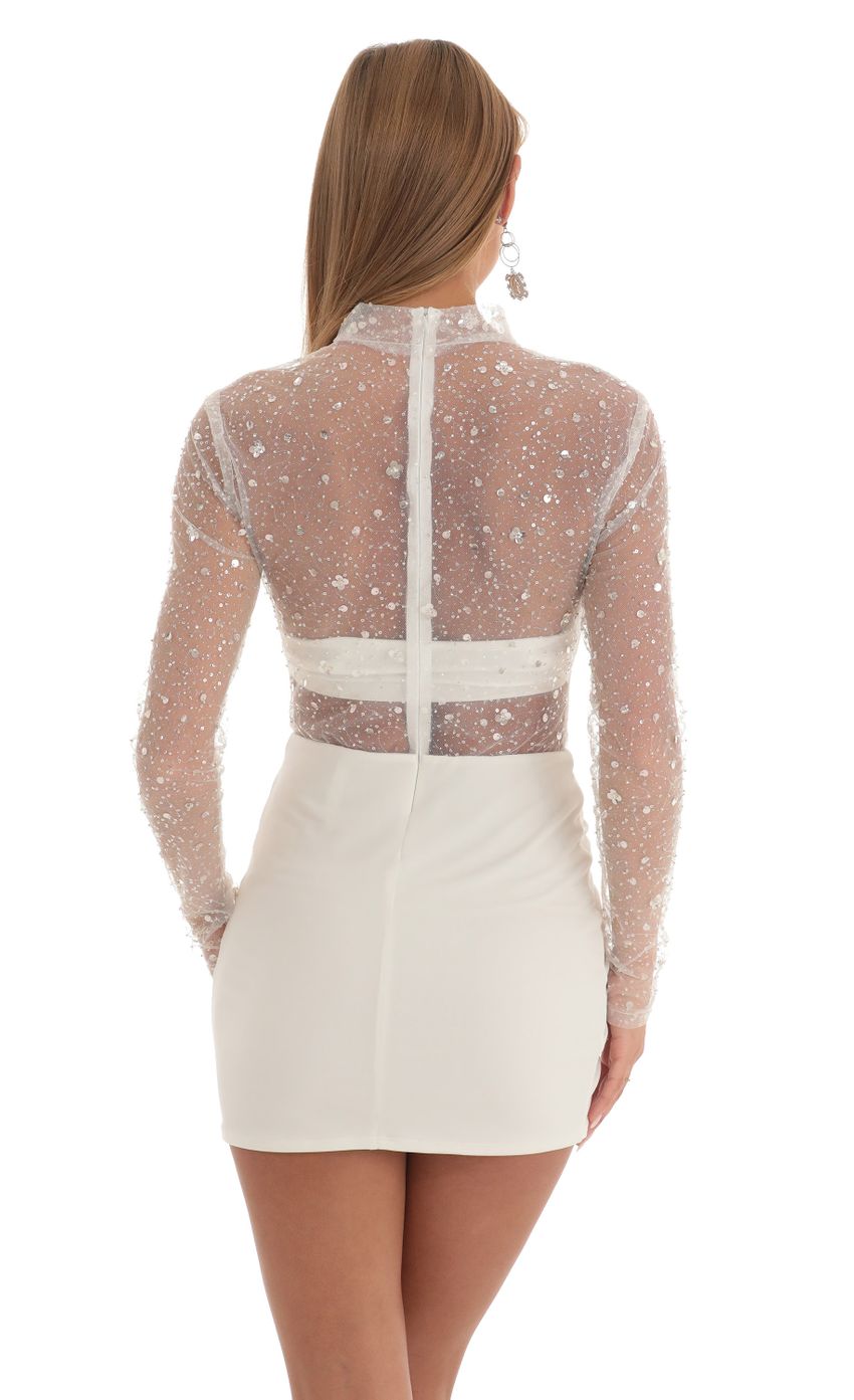 Picture Glitter Sheer Dress in White. Source: https://media-img.lucyinthesky.com/data/Feb23/850xAUTO/0d70459c-a455-40a6-9fd9-24e8118140ea.jpg