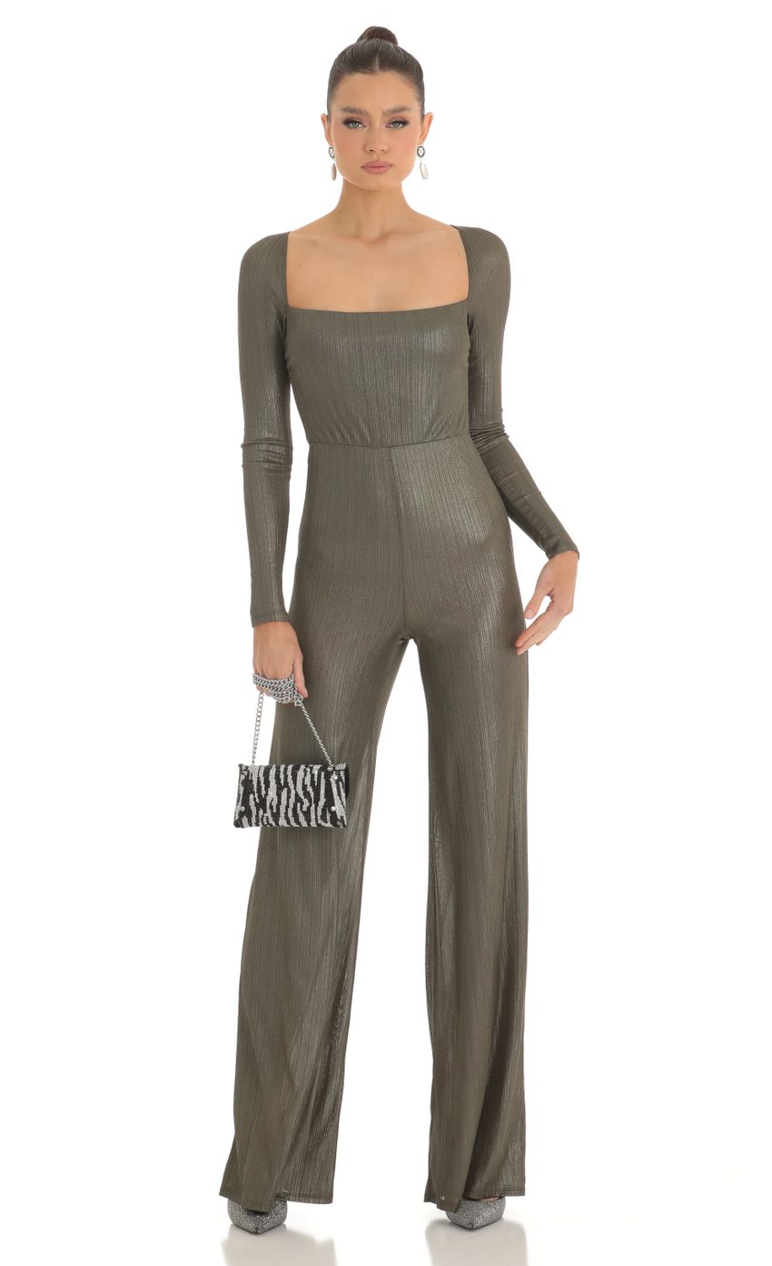 Picture Shimmer Open Back Long Sleeve Jumpsuit in Olive. Source: https://media-img.lucyinthesky.com/data/Feb23/850xAUTO/1e73412b-693a-4cbb-9281-036aab0d7696.jpg