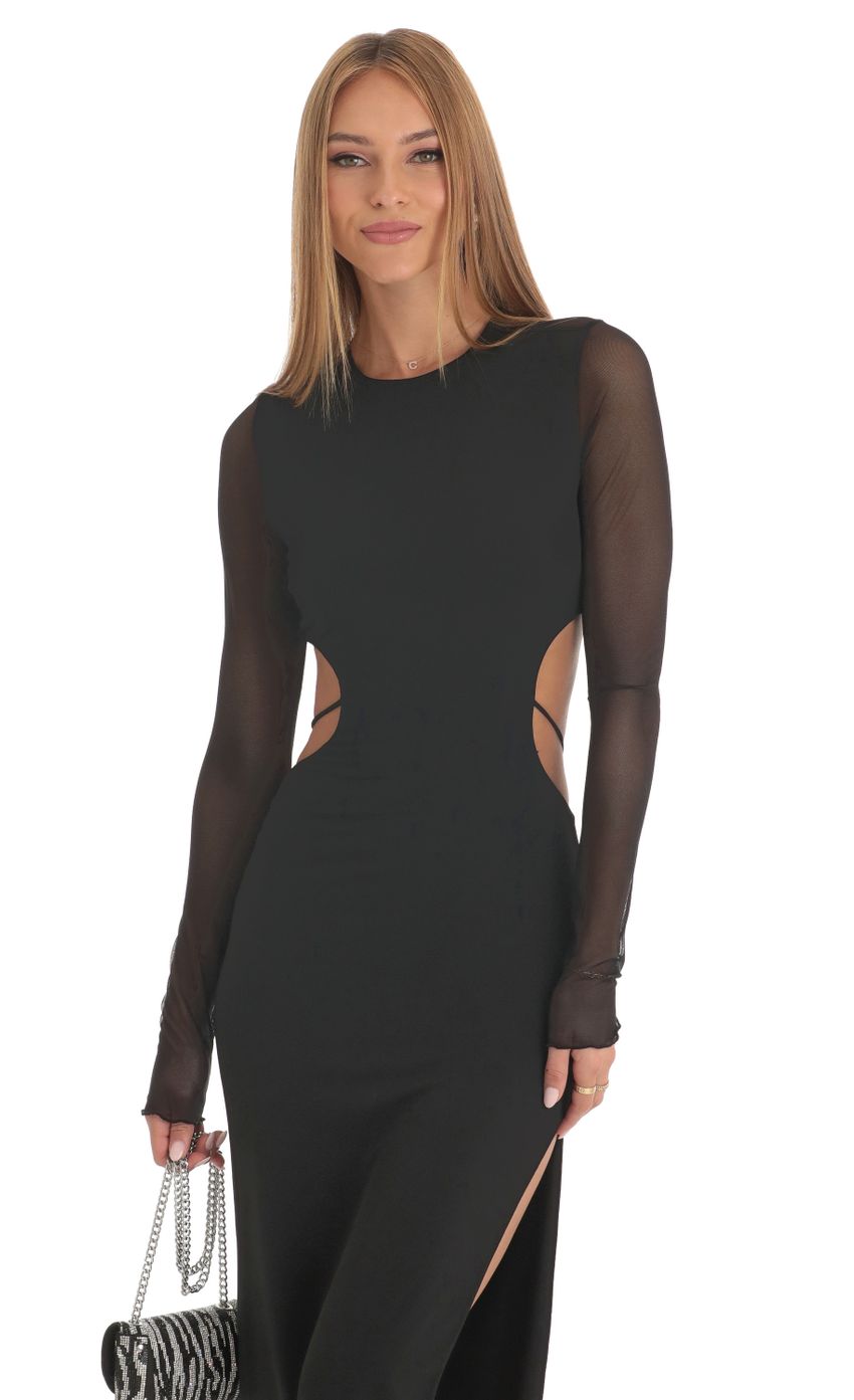 Picture Long Sleeve Sheer Back Dress in Black. Source: https://media-img.lucyinthesky.com/data/Feb23/850xAUTO/295cf4d4-2407-4469-84ae-c62d9d0fd5d8.jpg