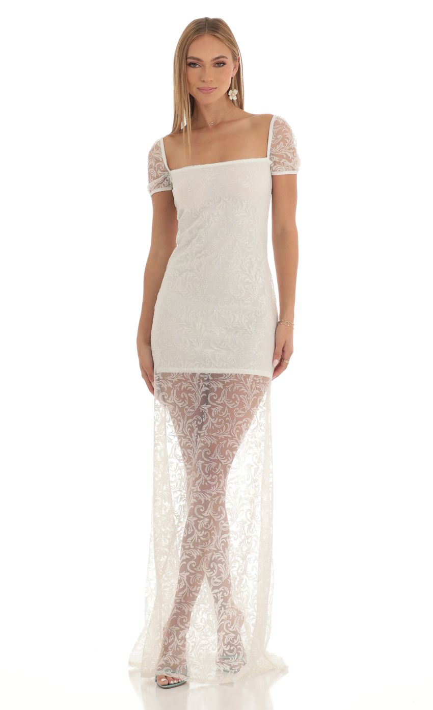 Picture Clarita Glitter Short Sleeve Maxi Dress in White. Source: https://media-img.lucyinthesky.com/data/Feb23/850xAUTO/2b73e1ea-9e42-4854-8e42-12bc17ede047.jpg
