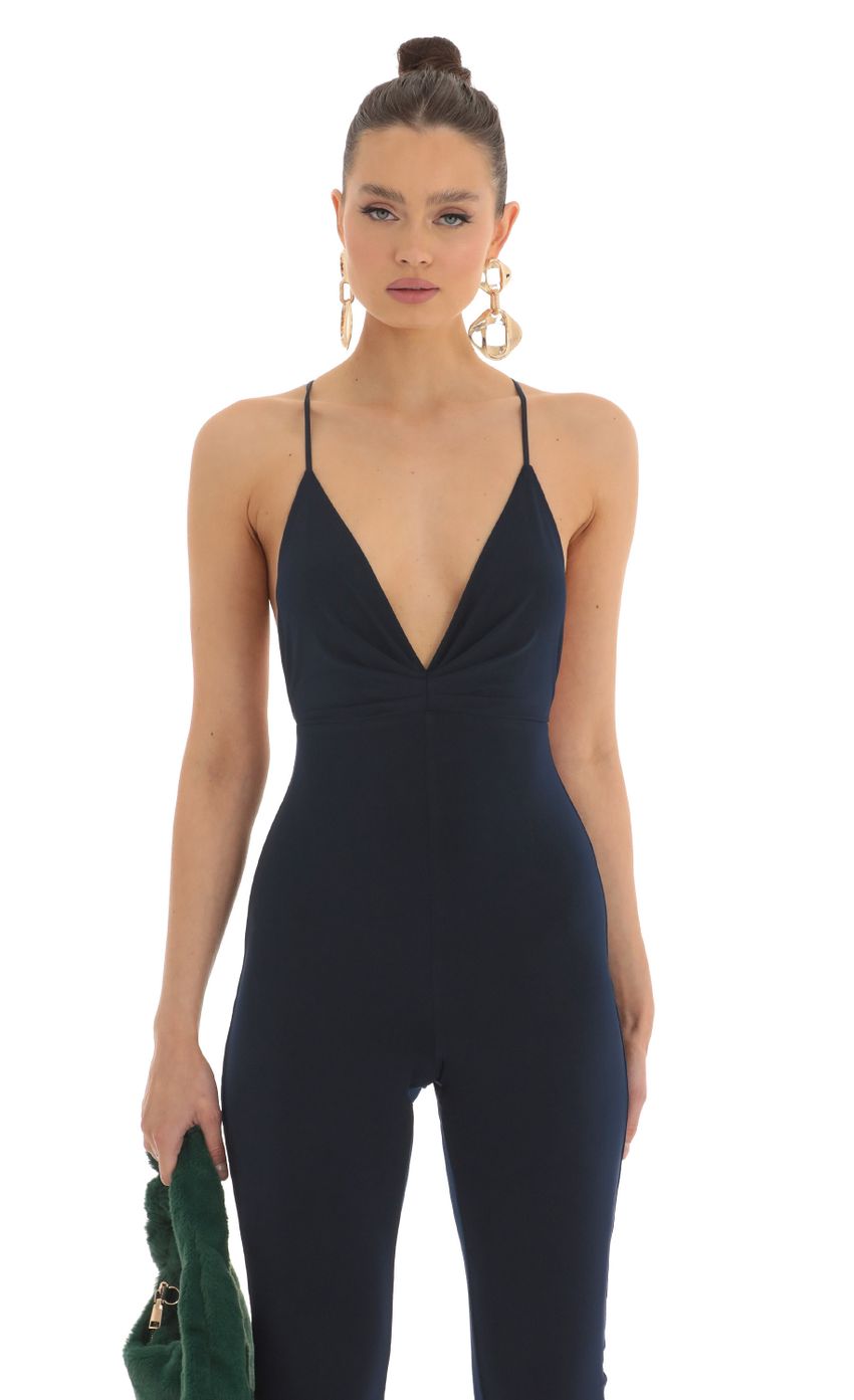 Picture Deep V Jumpsuit in Navy. Source: https://media-img.lucyinthesky.com/data/Feb23/850xAUTO/350a519a-9288-4502-bb7a-16fab5192245.jpg