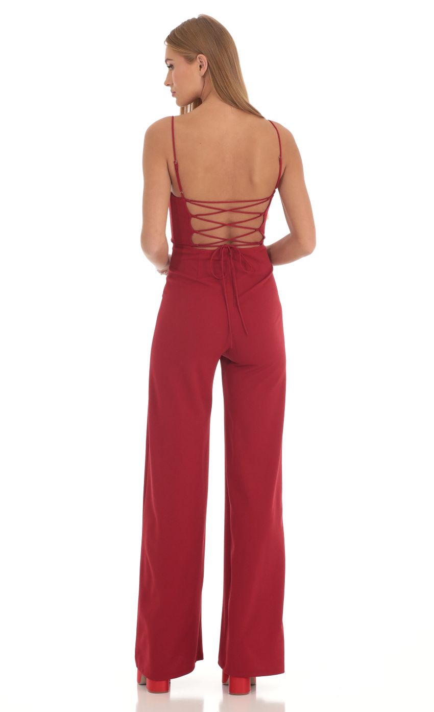 Picture Wide Leg Corset Jumpsuit in Red. Source: https://media-img.lucyinthesky.com/data/Feb23/850xAUTO/418922b7-cf6b-4b15-adfe-7880d96512f5.jpg