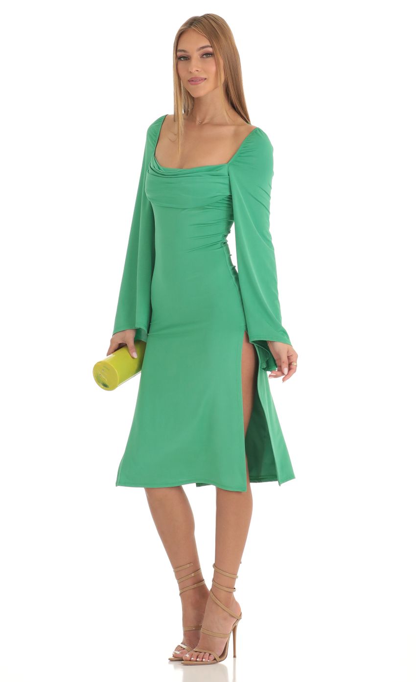 Picture Glitter Flare Sleeve Midi Dress in Green. Source: https://media-img.lucyinthesky.com/data/Feb23/850xAUTO/4bcee1c1-9838-47e1-bc09-f9c7d23e976a.jpg
