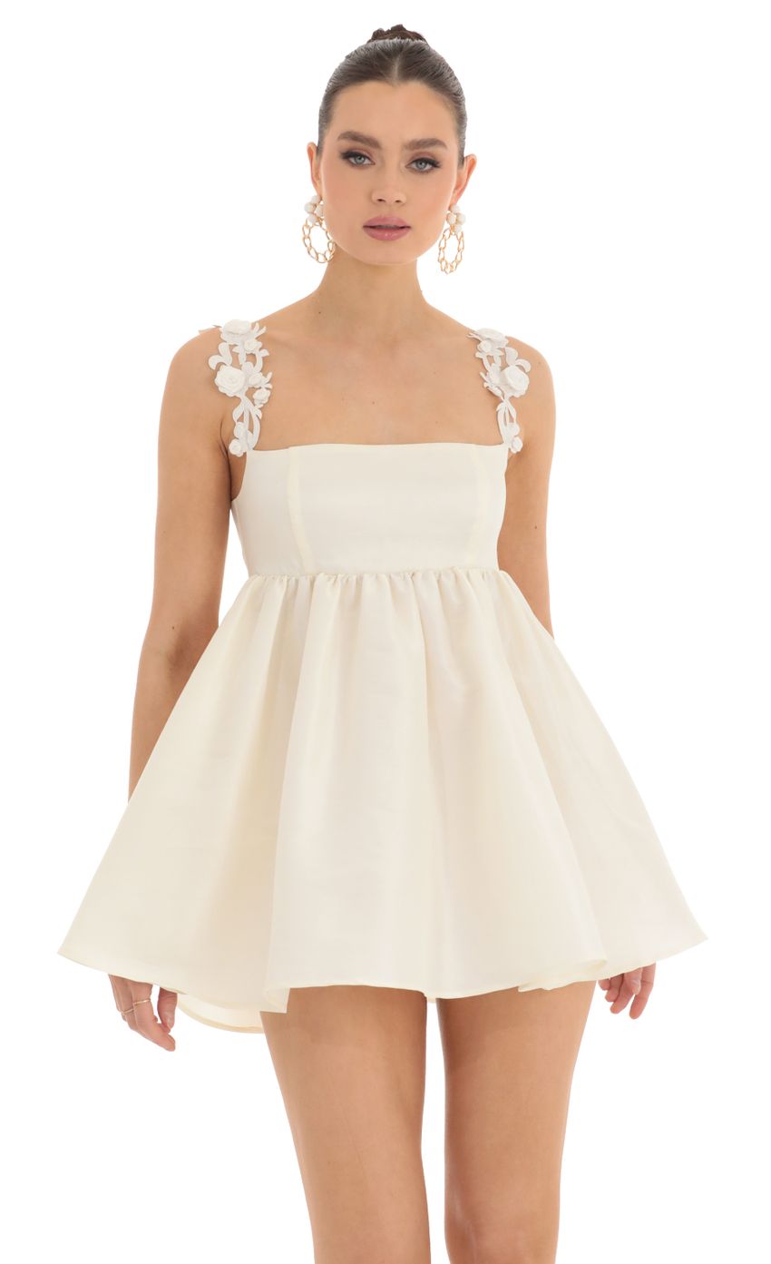 Picture Floral Strap Baby Doll Dress in Cream. Source: https://media-img.lucyinthesky.com/data/Feb23/850xAUTO/56b83b42-28d6-471d-9b03-3be727612e24.jpg