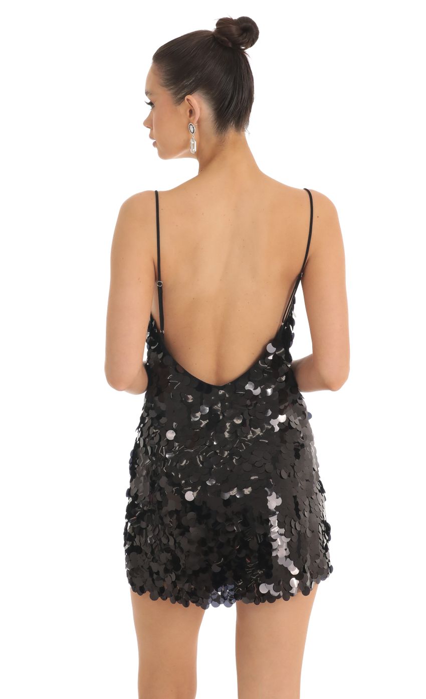 Picture Big Sequin Cami Dress in Black. Source: https://media-img.lucyinthesky.com/data/Feb23/850xAUTO/5f78ae73-1a02-4be0-8cc9-fb4b2d37ab8c.jpg