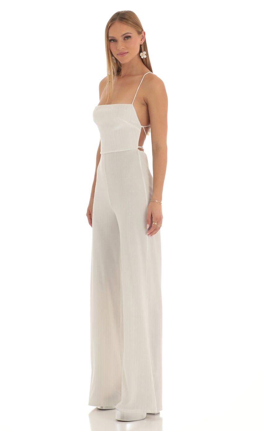 Picture Harlin Striped Velvet Jumpsuit in White. Source: https://media-img.lucyinthesky.com/data/Feb23/850xAUTO/61026ccd-df5f-4d60-8965-00ae6f21eee5.jpg